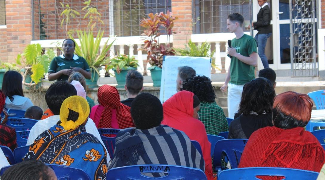 An intern gives a presentation to women entrepreneurs on one of our international Micro-finance placements.