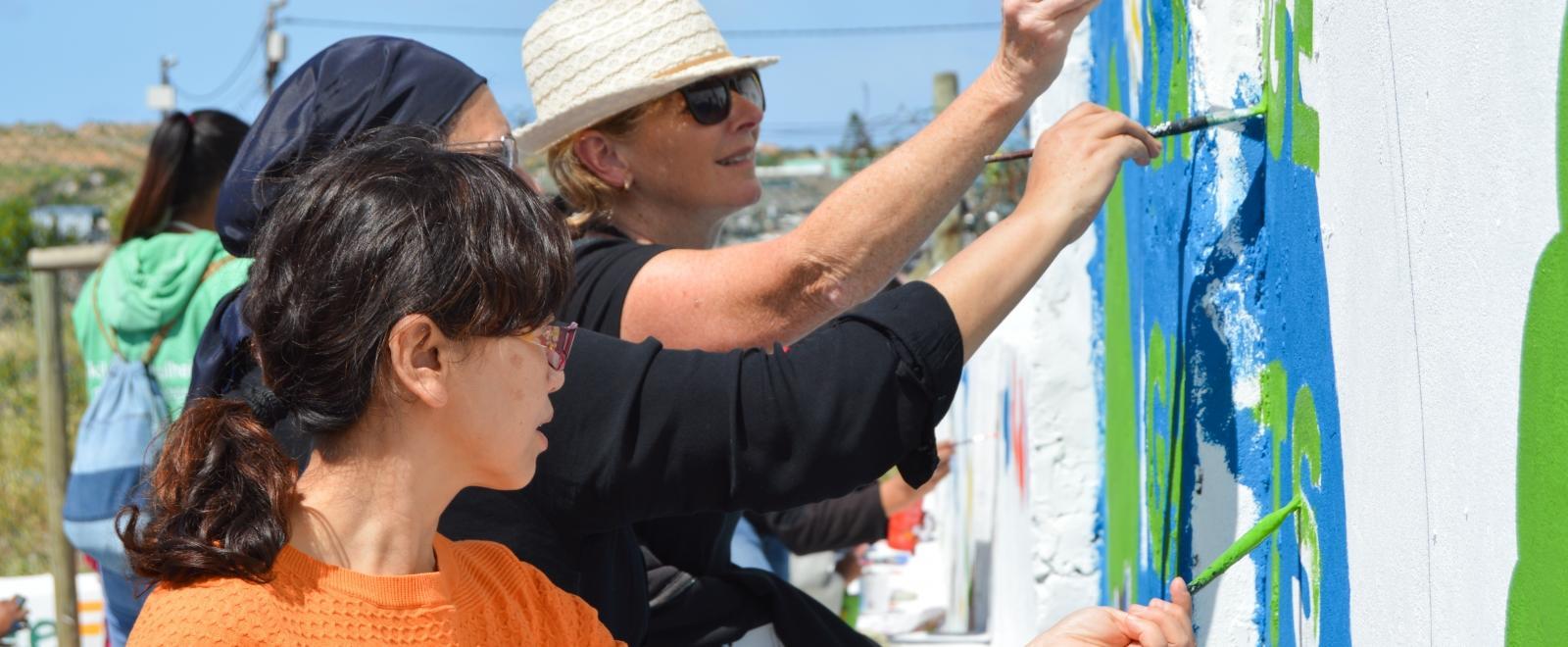 Childcare volunteers add colour to a care centre during Projects Abroad volunteer trips.