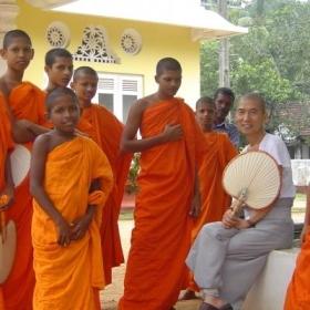 Young monks stand together near Sri Lanka volunteering opportunities with Projects Abroad.