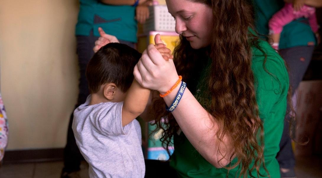 An intern assesses a young child at a daycare centre during one of our Social Work internships.