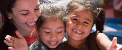 Happy children with their teacher at one of Projects Abroad's volunteer teaching placements in Costa Rica