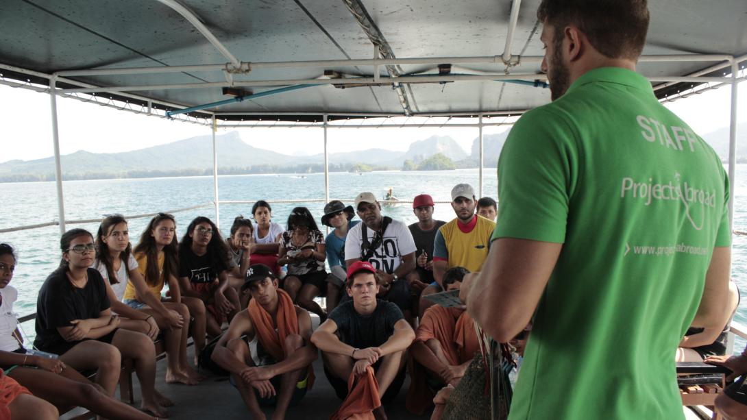 Projects Abroad staff member runs volunteers through safety procedures in Thailand.