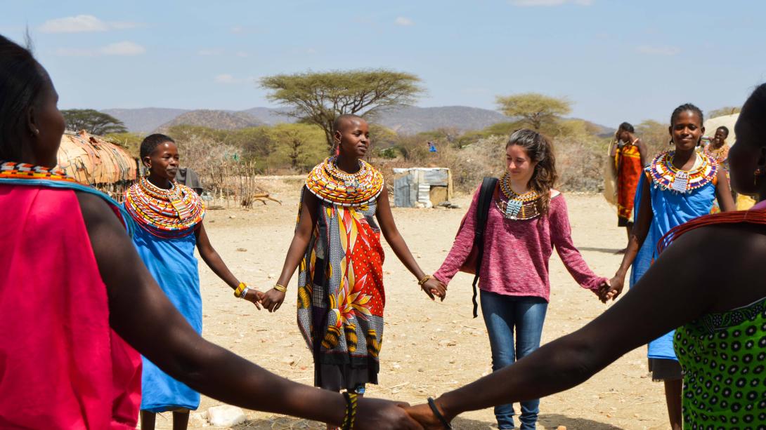 Projects Abroad volunteers learn a traditional dance during their project in Tanzania.