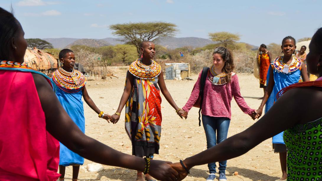 Projects Abroad volunteers learn a traditional dance during their project in Tanzania.