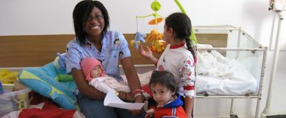 Projects Abroad volunteer works with children on the Romania Childcare Project