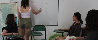 A small group of volunteers in Argentina learn and practice Spanish together.