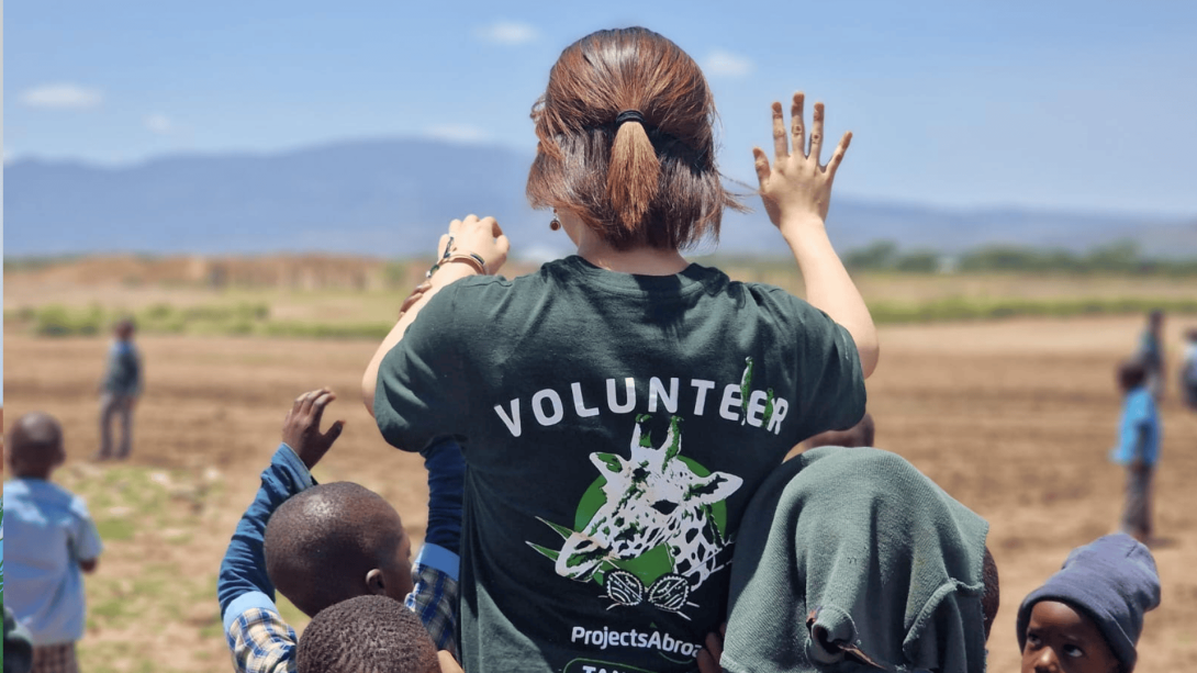 A Japanese volunteer enjoys her time doing childcare volunteering in Tanzania