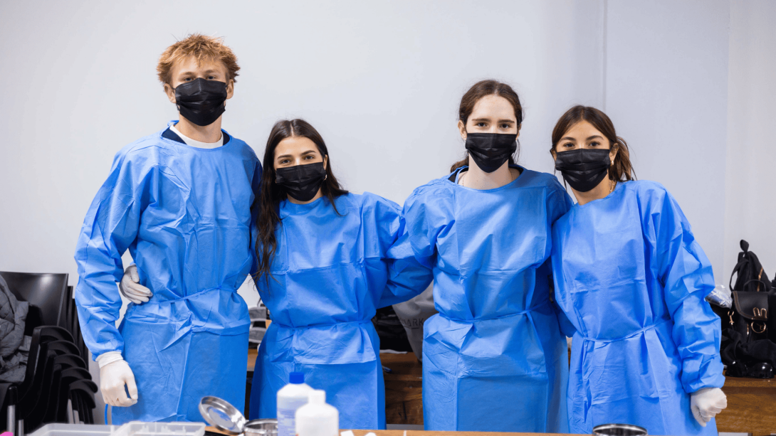 Teen medical volunteers pose for a picture in Peru